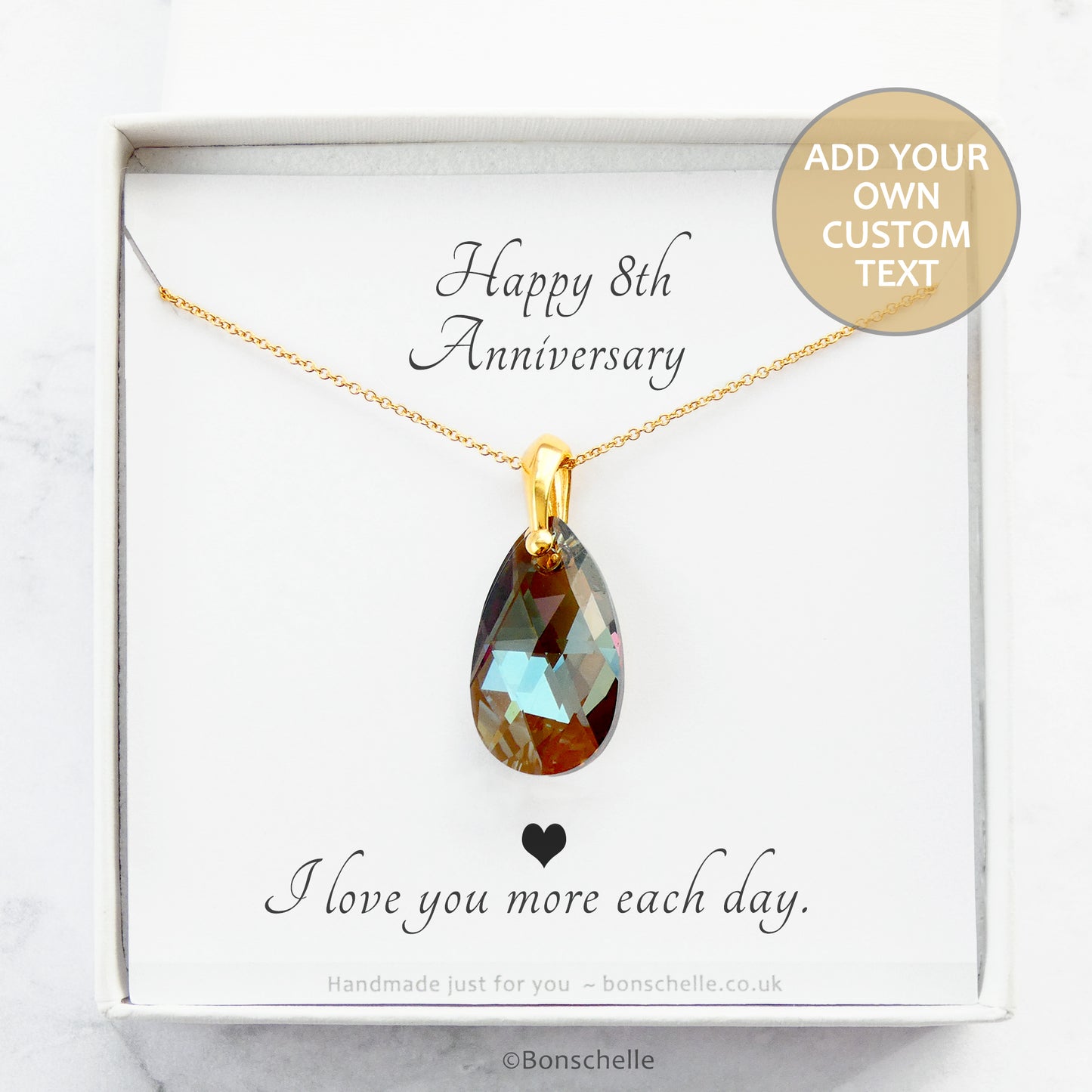 Handmade necklace with a bronze toned teardrop shape faceted crystal bead and 14K gold filled chain for womenin a gift box with a personalised message card inside.