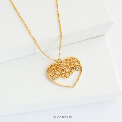 18K gold plated filligree heart with 3 tiny cubic zirconia and a 14K gold filled chain