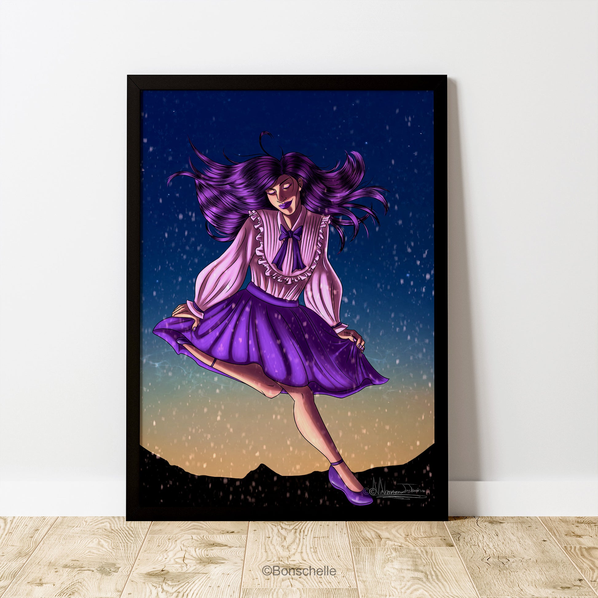 An original art print featuring a young girl in Lolita fashion dancing happily in the snow against an evening sky. The poster is framed in black, sits on a wooden floor and leans against a white wall.