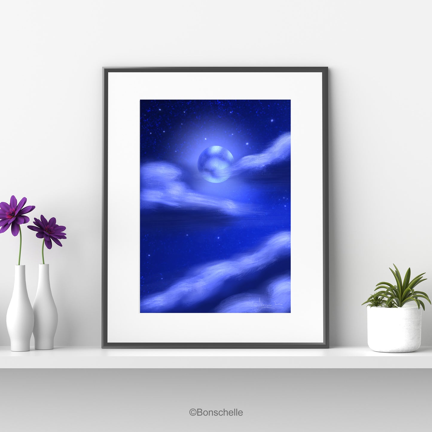 Original Art poster print with image of the Night Sky with full moon and clouds, mounted on a white background with a black frame and standing on a white shelf with flowerpots each side.