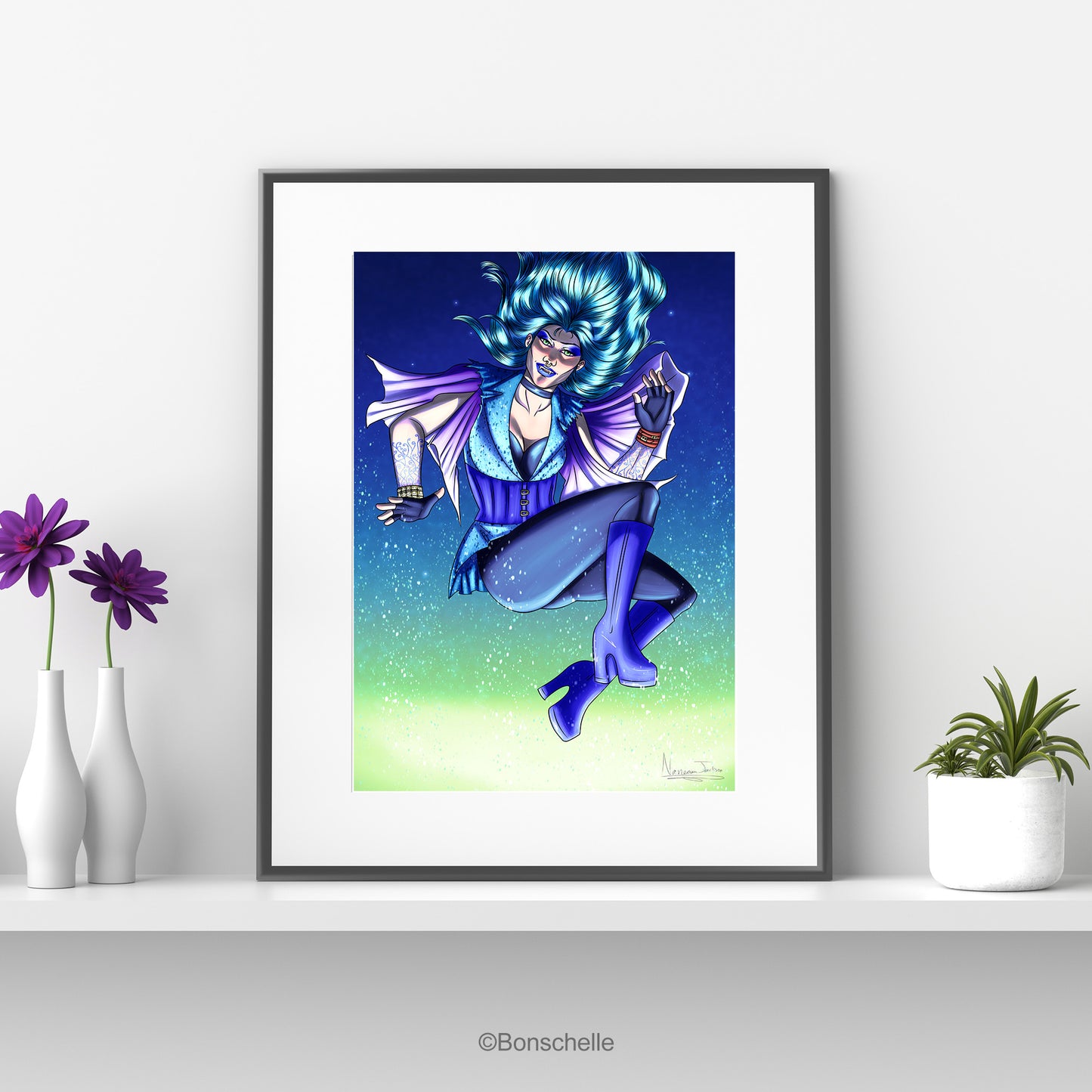 An original art print in which a vampire-witch with electric-blue hair flies in the air while the snow falls. The print is mounted on a white background and framed in black. It sits on a white shelf with flowers in vases on one side and a flowerpot on the other.