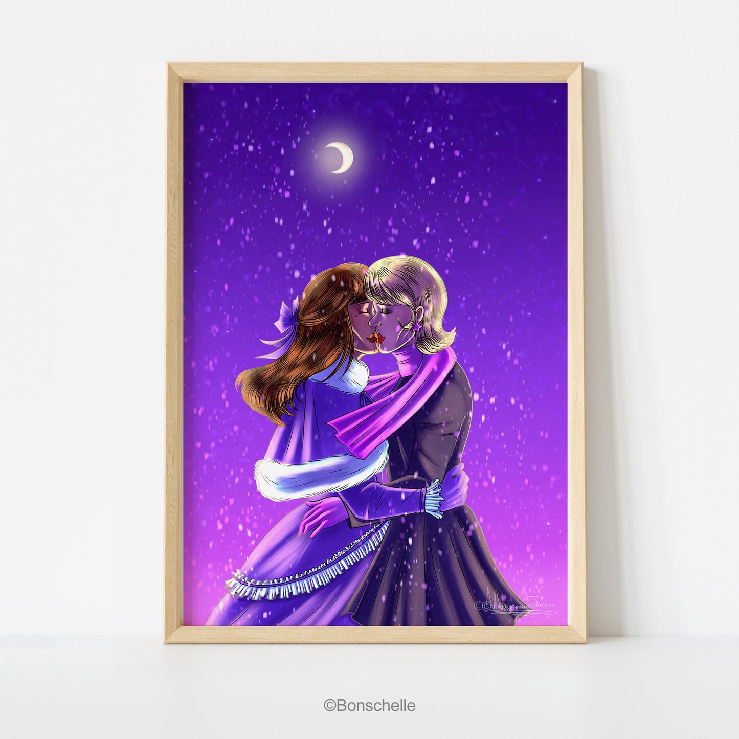 An original art print showing two young woman sharing a kiss in the snow against a purple night sky. A crescent moon is overhead.  The print is framed in pinewood.