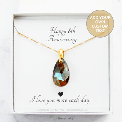 Handmade necklace with a bronze toned teardrop shape faceted crystal bead and 14K gold filled chain for womenin a gift box with a personalised message card inside.