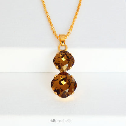 front view of Bronze toned couble cushion cut crystal necklace for women