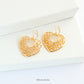 18K gold plated filigree heart earrings with 14K gold filled earwires shown on a jewellery box