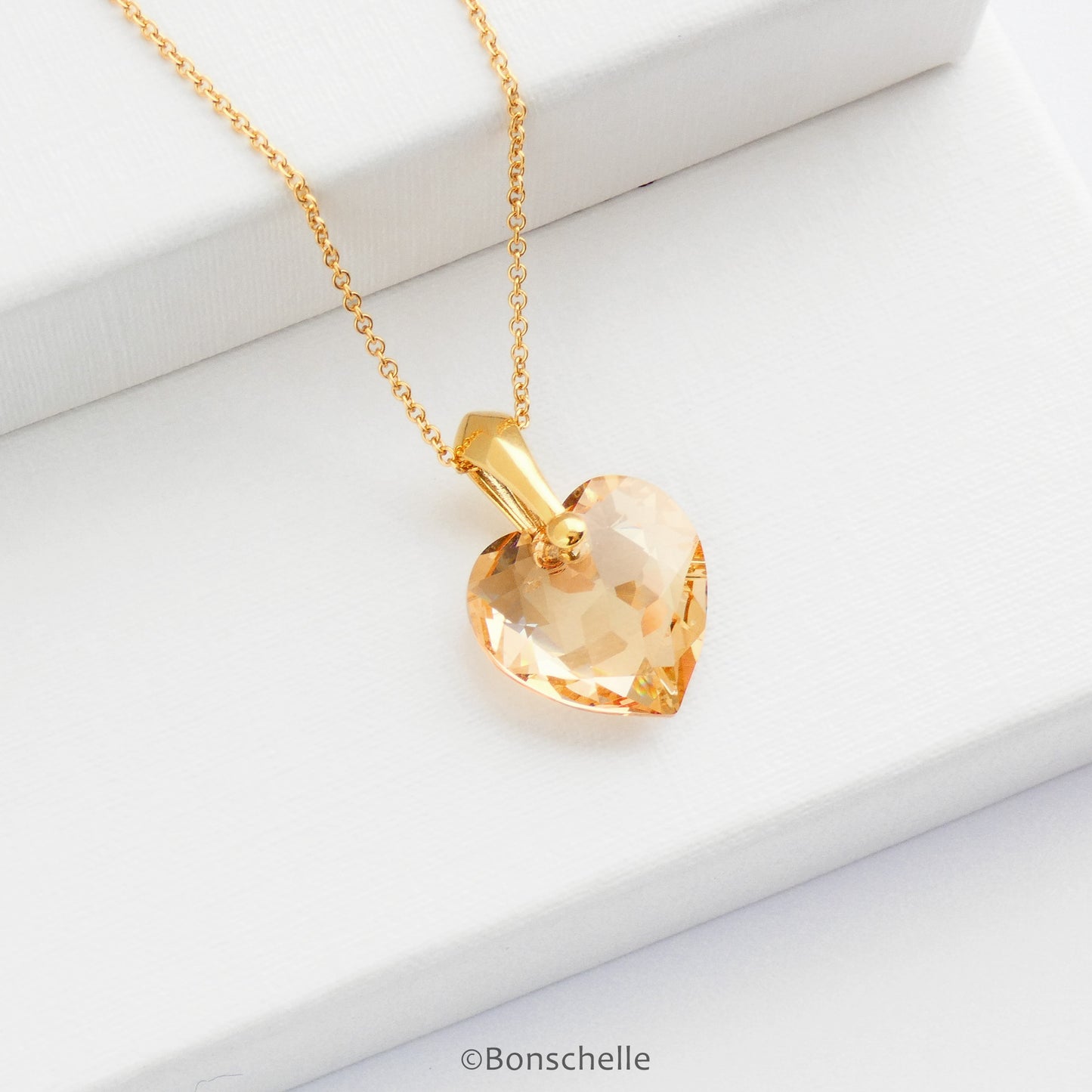 Golden_Crystal_Anniversary_Heart_necklace_2.jpg  2000 × 2000px  handmade necklace with pale gold colour crystal cut Swarovski heart pendant and 14K gold filled chain 
