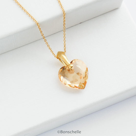 handmade necklace with pale gold colour crystal cut Swarovski heart pendant and 14K gold filled chain