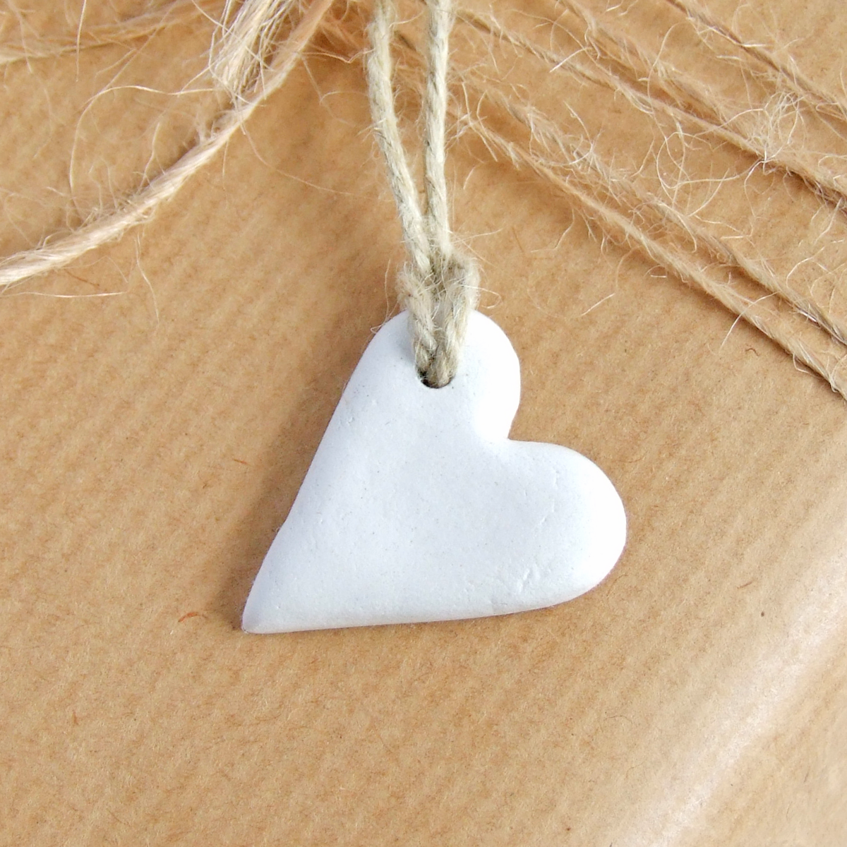 Handmade white clay mini heart gift tags or favors by Bonschelle