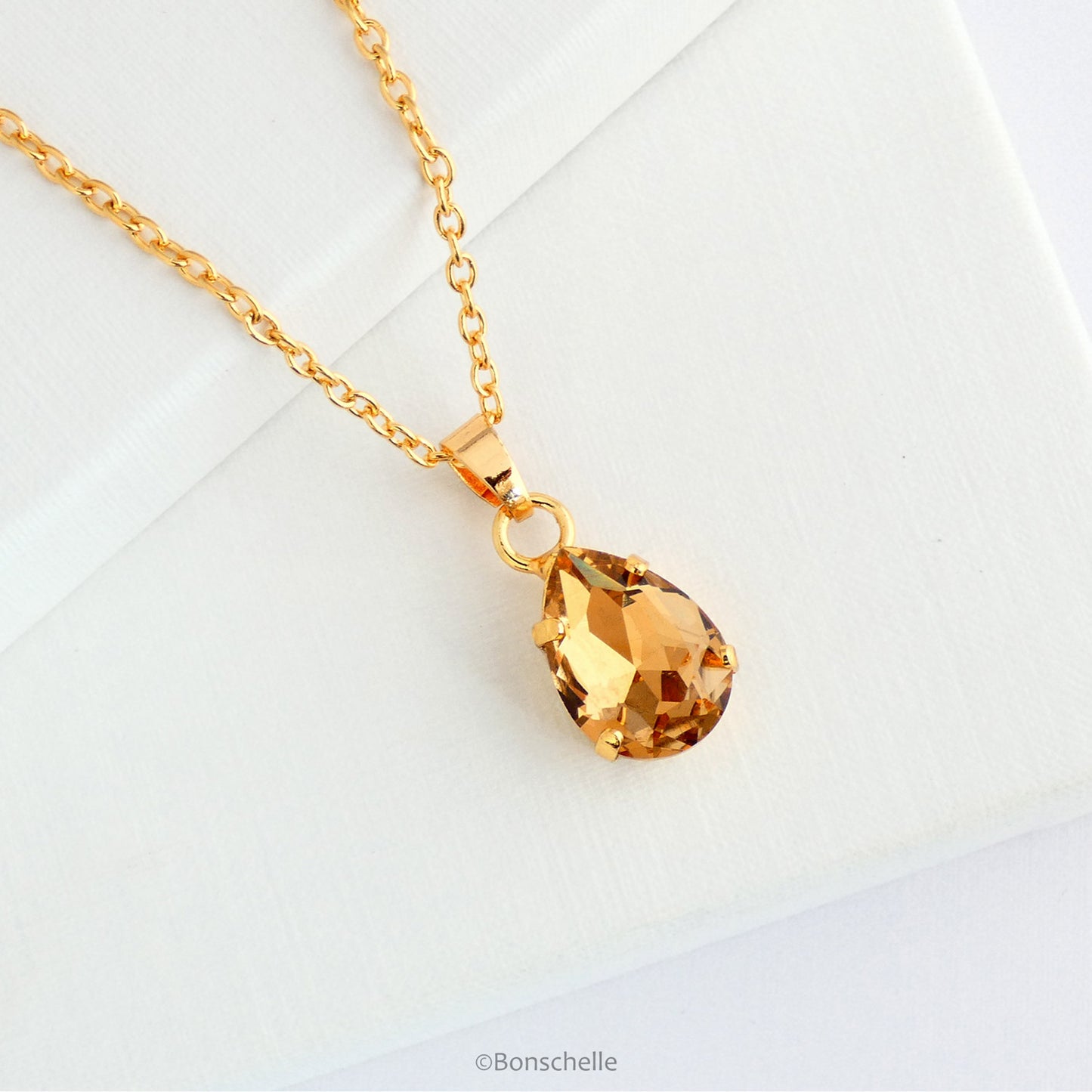 Bronze or Topaz coloured crystal pear necklace with gold plated chain
