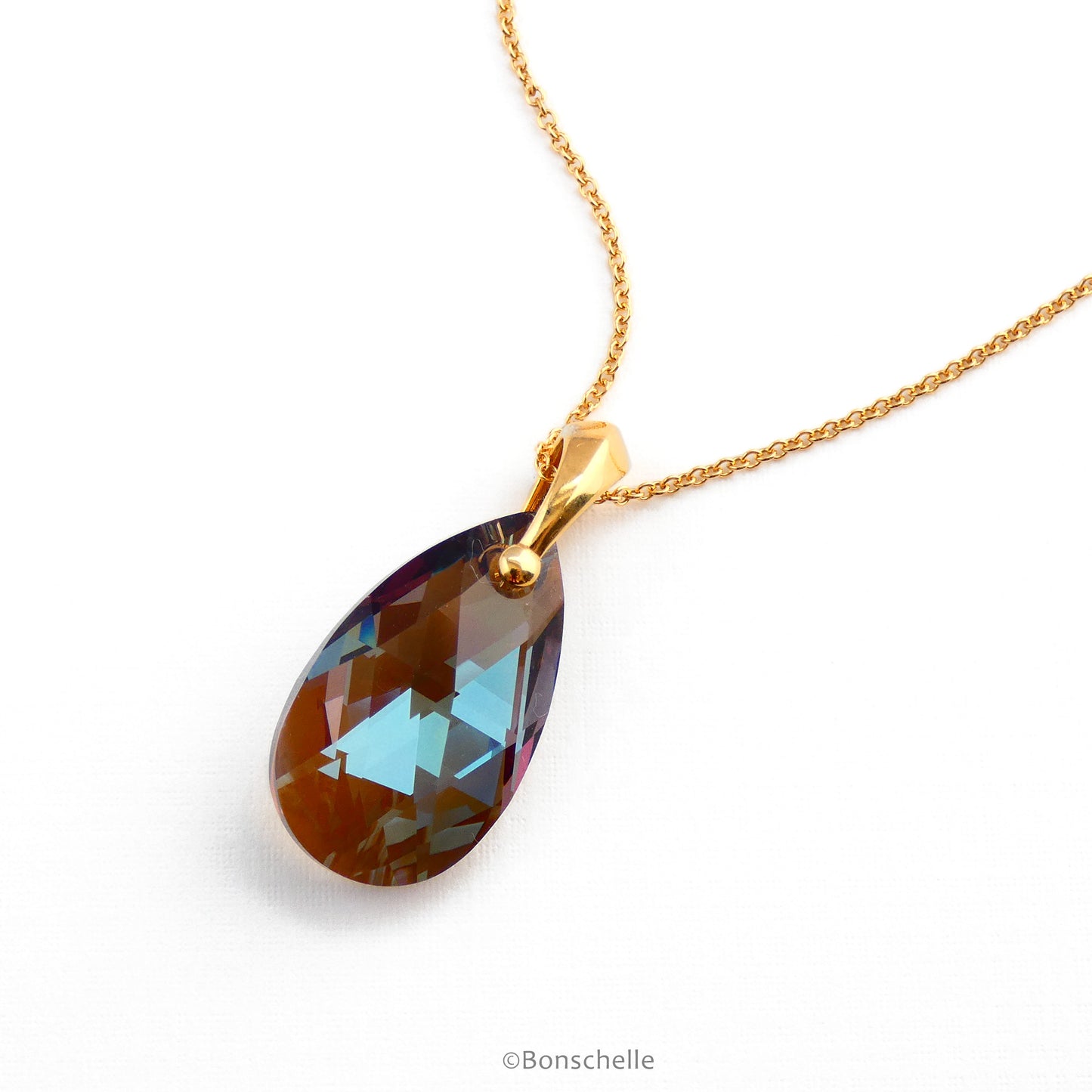 Alternate view of a handmade necklace with a teardrop shape bronze toned cut glass crystal bead and 14K gold filled chain