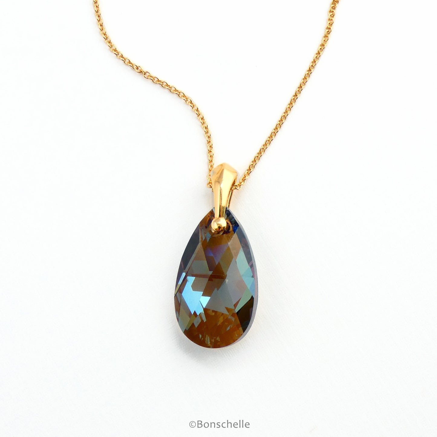 Handmade necklace with a bronze toned teardrop shape faceted crystal bead and 14K gold filled chain for women.