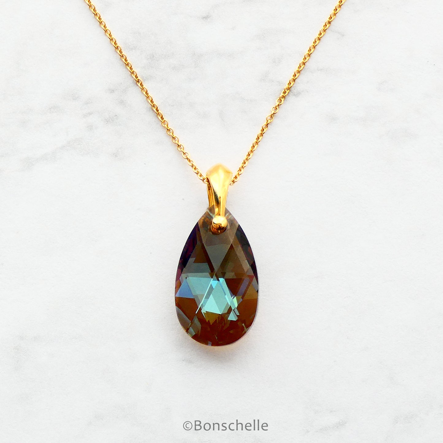 Handmade necklace with a teardrop shape bronze toned cut glass crystal bead and 14K gold filled chain