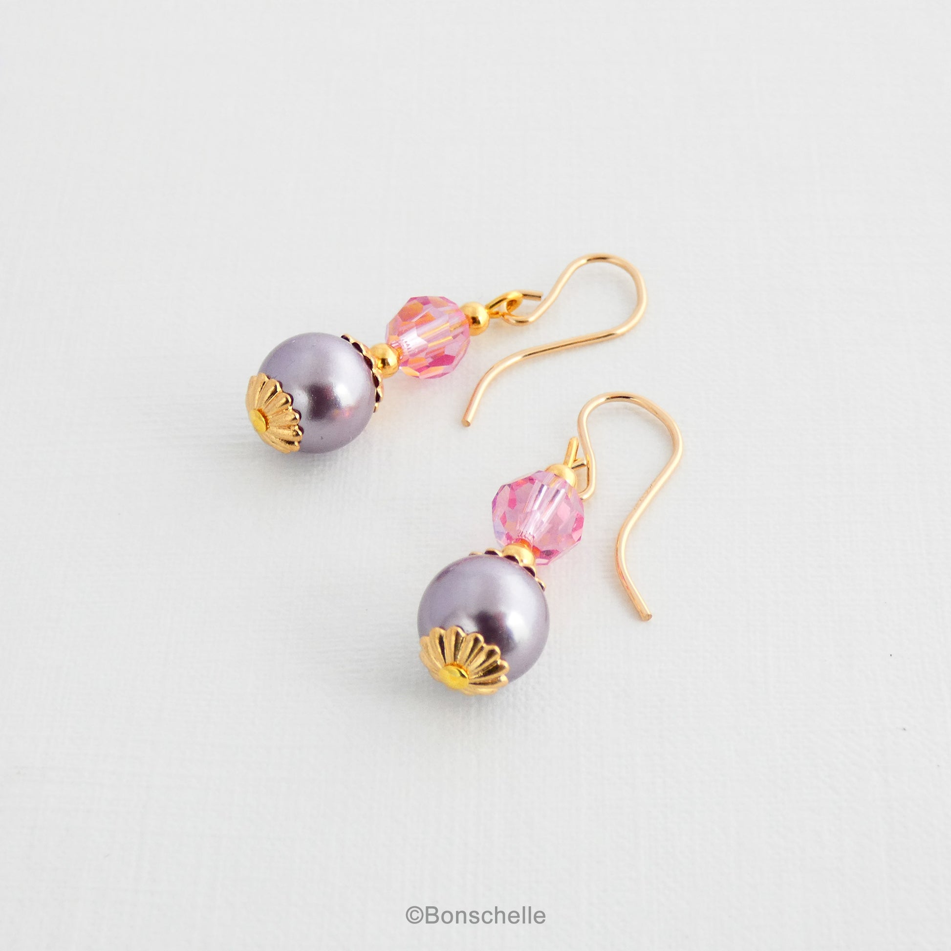 Women's pearl and crystl earrings with lilac pearls and pink crystal beads