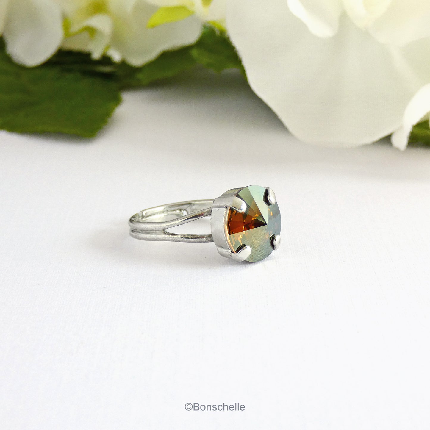 silver toned solitaire ring for women with a deep bronze Swarovksi crystal stone.