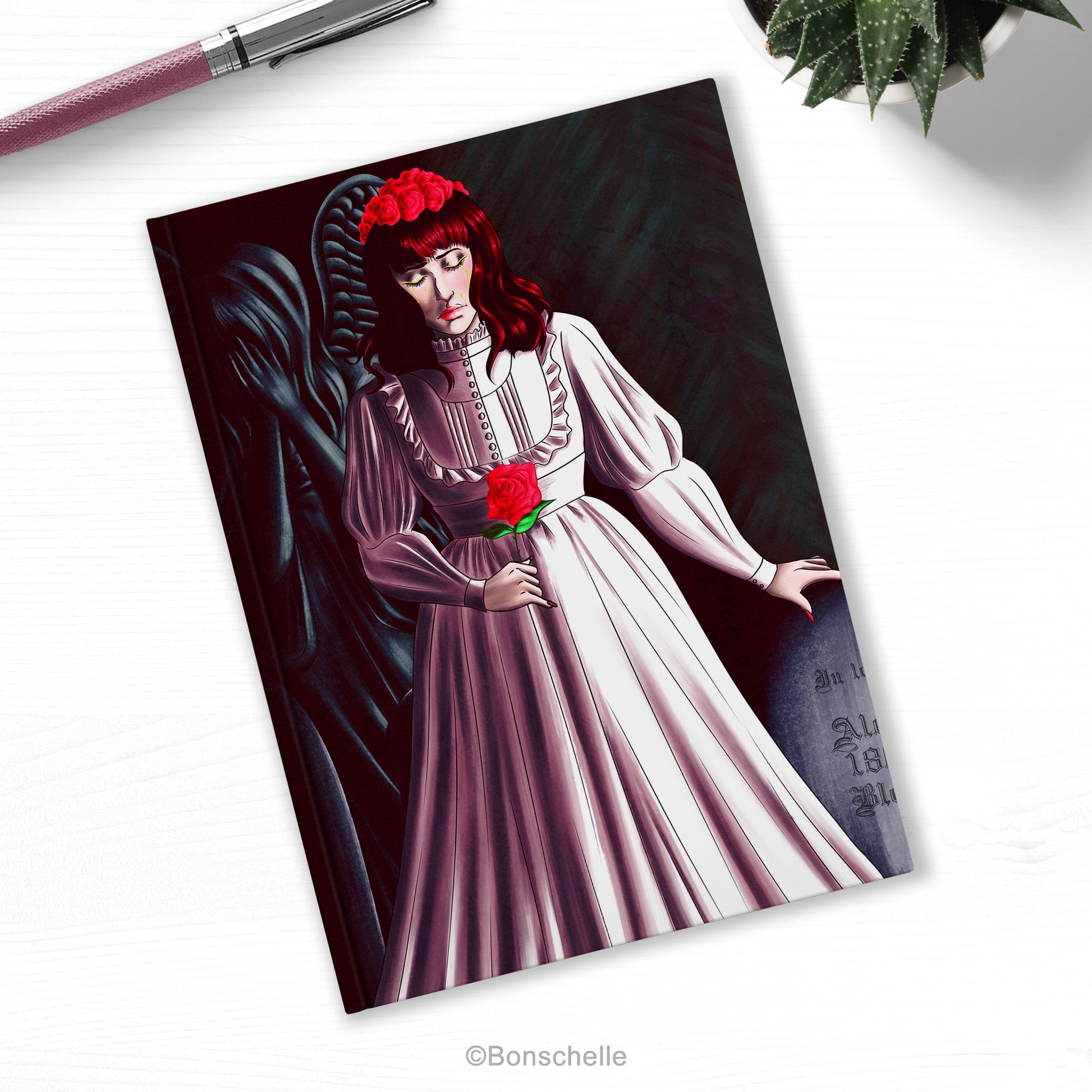 Vampire Lolita with Weeping Angel Illustrated Hardback Journal Notebook on a desk