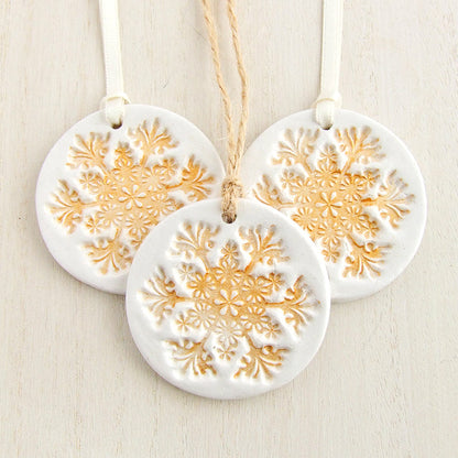 Round White clay Christmas decoration with gold snowflake pattern 1